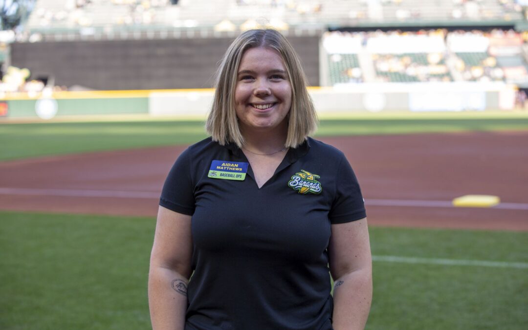 Aidan Matthews smiling at camera, from the playing field at T-Mobile Park, home of the Seattle Mariners.